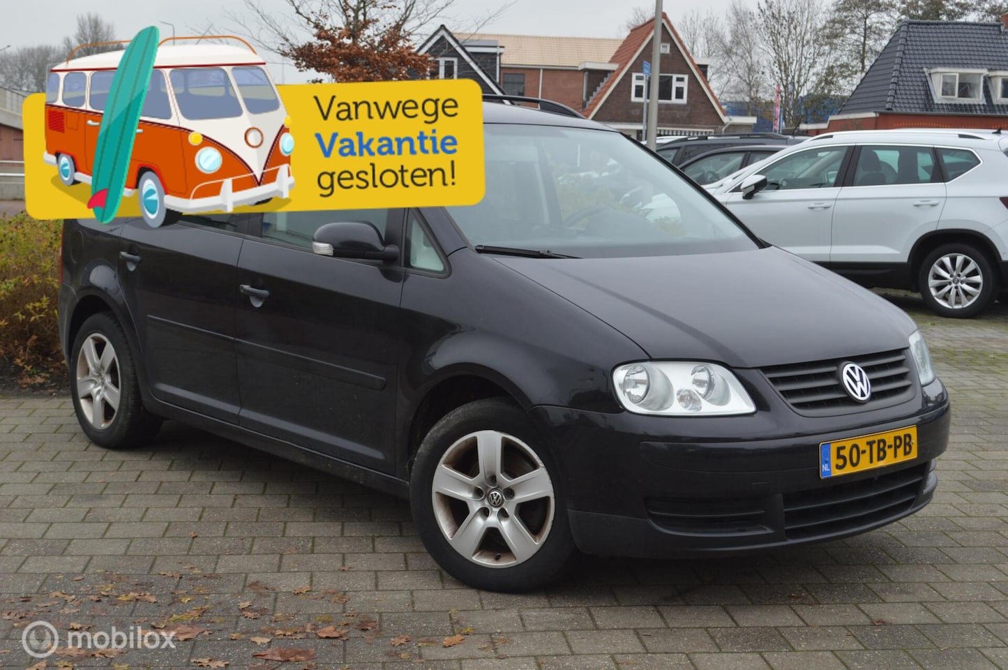 Volkswagen Touran - 1.6-16V FSI Business 1.6-16V FSI Business - AutoWereld.nl