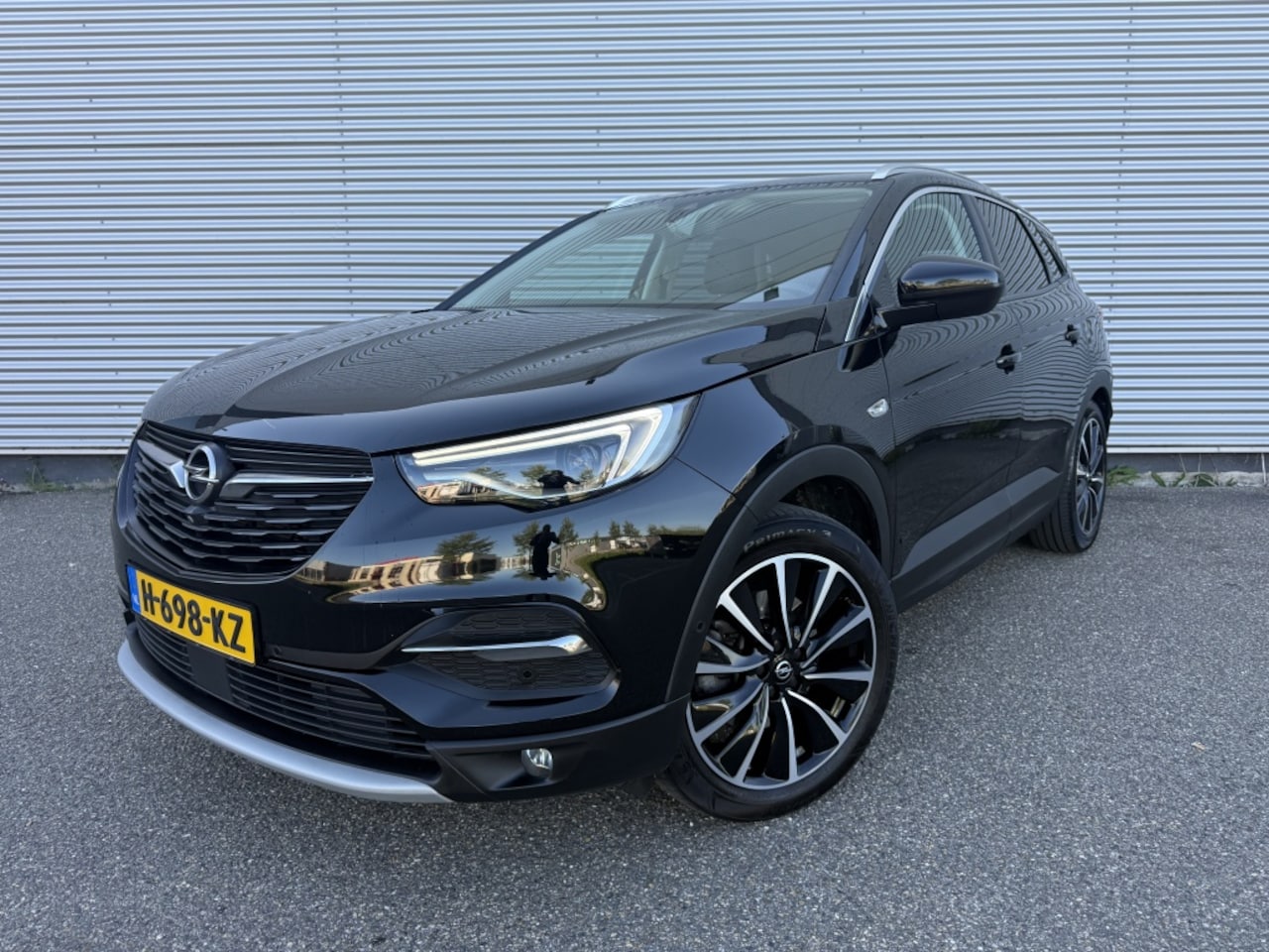 Opel Grandland X - 1.6 THybr Innovation NAP Dealer OH Leer Trekhaak 4wd 1e eigenaar - AutoWereld.nl