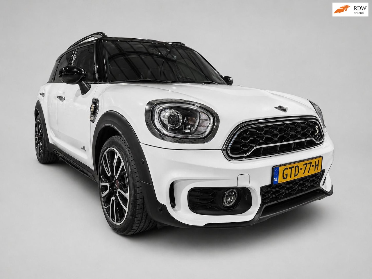 MINI Countryman - Mini 2.0 Cooper S E ALL4 Chili - JCW Pakket - Panoramadak - HuD - Leder - Adapt Cruise - P - AutoWereld.nl