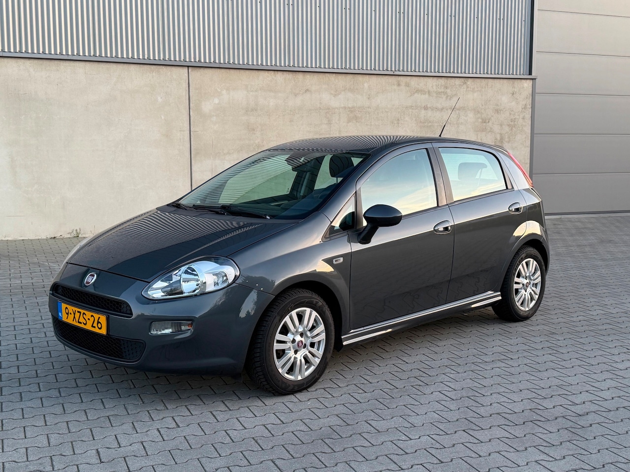Fiat Punto Evo - 1.3 M-Jet Street 5 DEURS+AIRCO+PDC+RADIO USB AUX+VELGEN - AutoWereld.nl