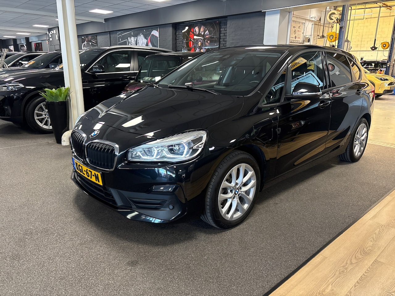 BMW 2-serie Active Tourer - 225xe iPerformance High Executive 225xe iPerformance High Executive,pano/navi/camera/stoelverw/elec klep - AutoWereld.nl
