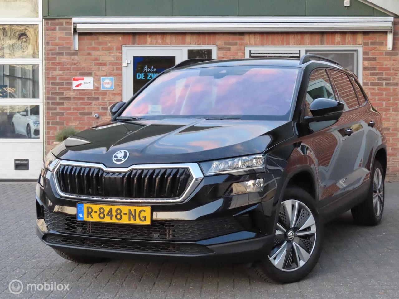Skoda Karoq - 1.5 TSI ACT Sportline Business|Facelift|Camera|Stoelverwarming|El achterklep|Carplay. - AutoWereld.nl