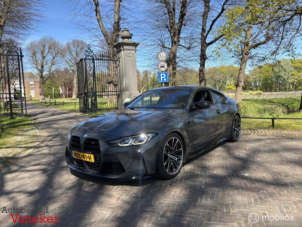 BMW M4 - xDrive Competition|Schaalstoelen|Garantie 2027|H&K|HUD| - AutoWereld.nl