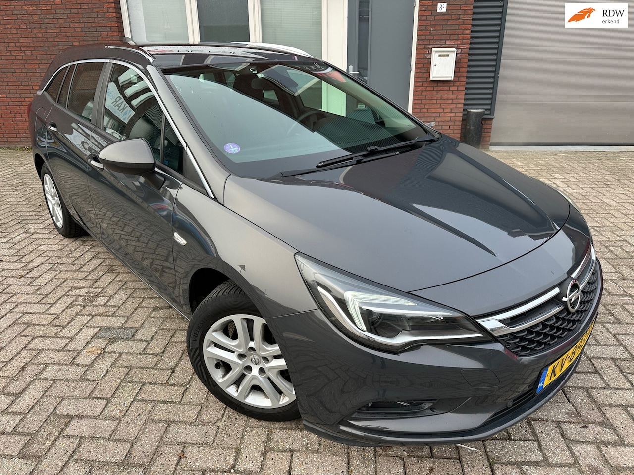 Opel Astra Sports Tourer - 1.0 Edition / Airco / Cruise / Navi / NAP / PDC - AutoWereld.nl