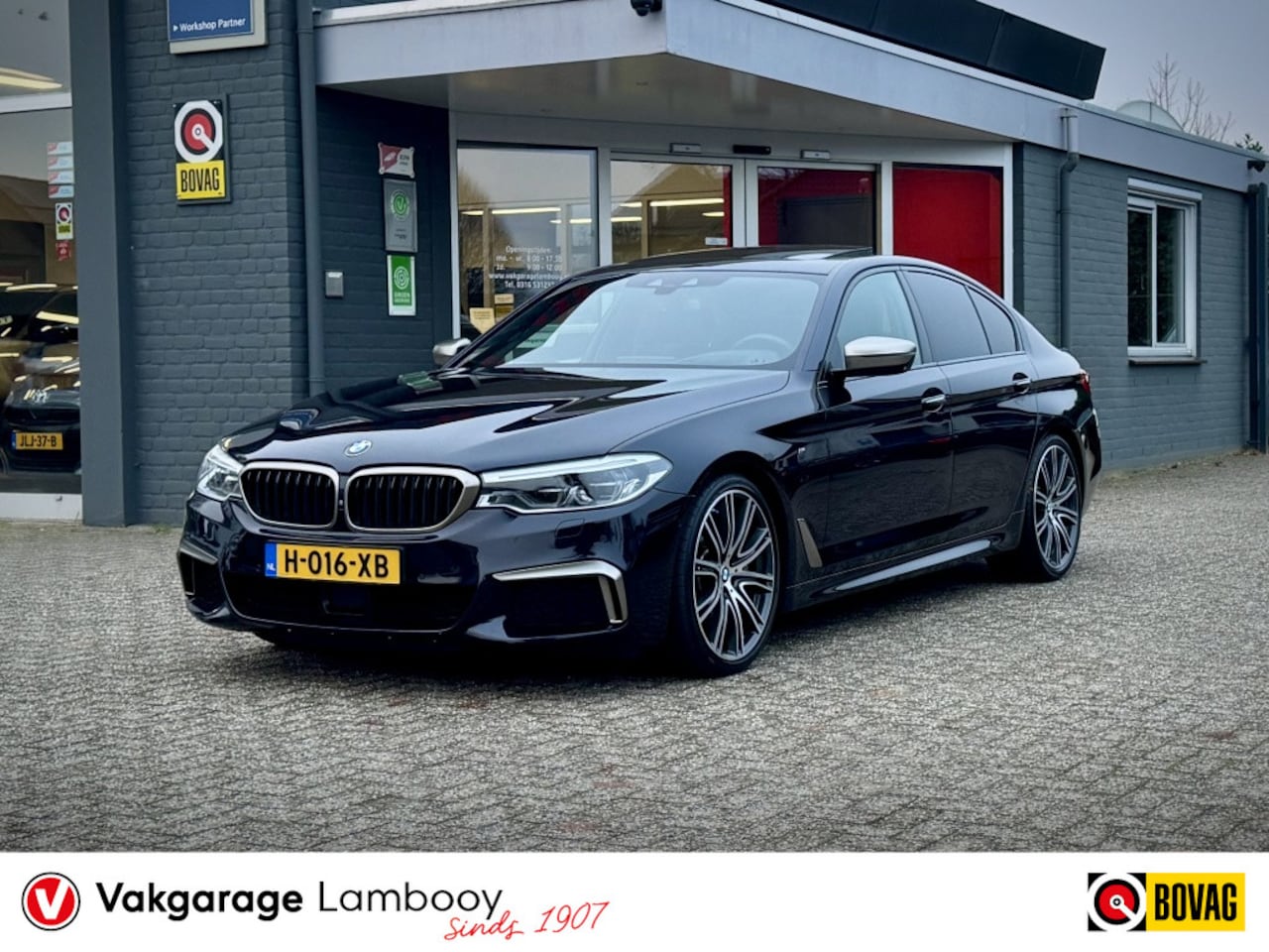 BMW 5-serie - M550i xDrive High Executive 360 Softclose Massage Trekhaak Stoel - AutoWereld.nl