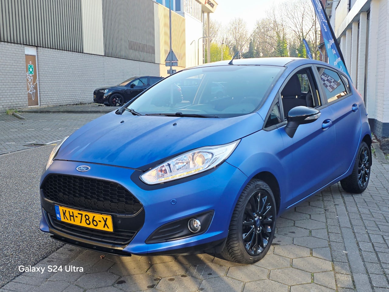 Ford Fiesta - 1.0 Style Ultimate*zeer nette auto*dealer onderhoud*nap*apk*airco*gewarpt blouw mat*velgen - AutoWereld.nl
