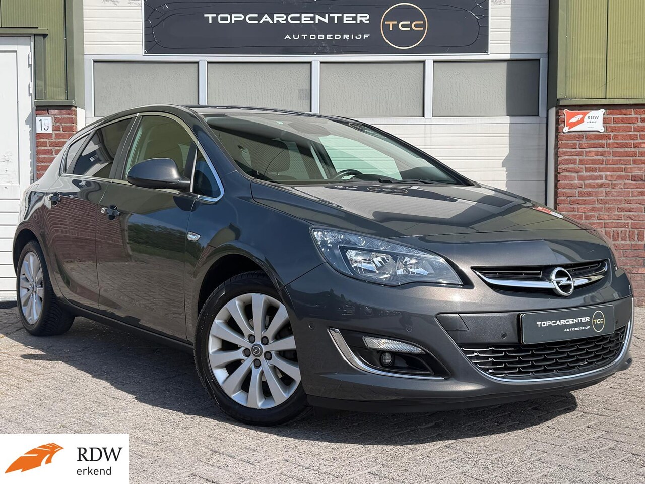 Opel Astra - 1.4 Turbo Sport +/AIRCO/PARKS/CAMERA/NAVI/APK - AutoWereld.nl
