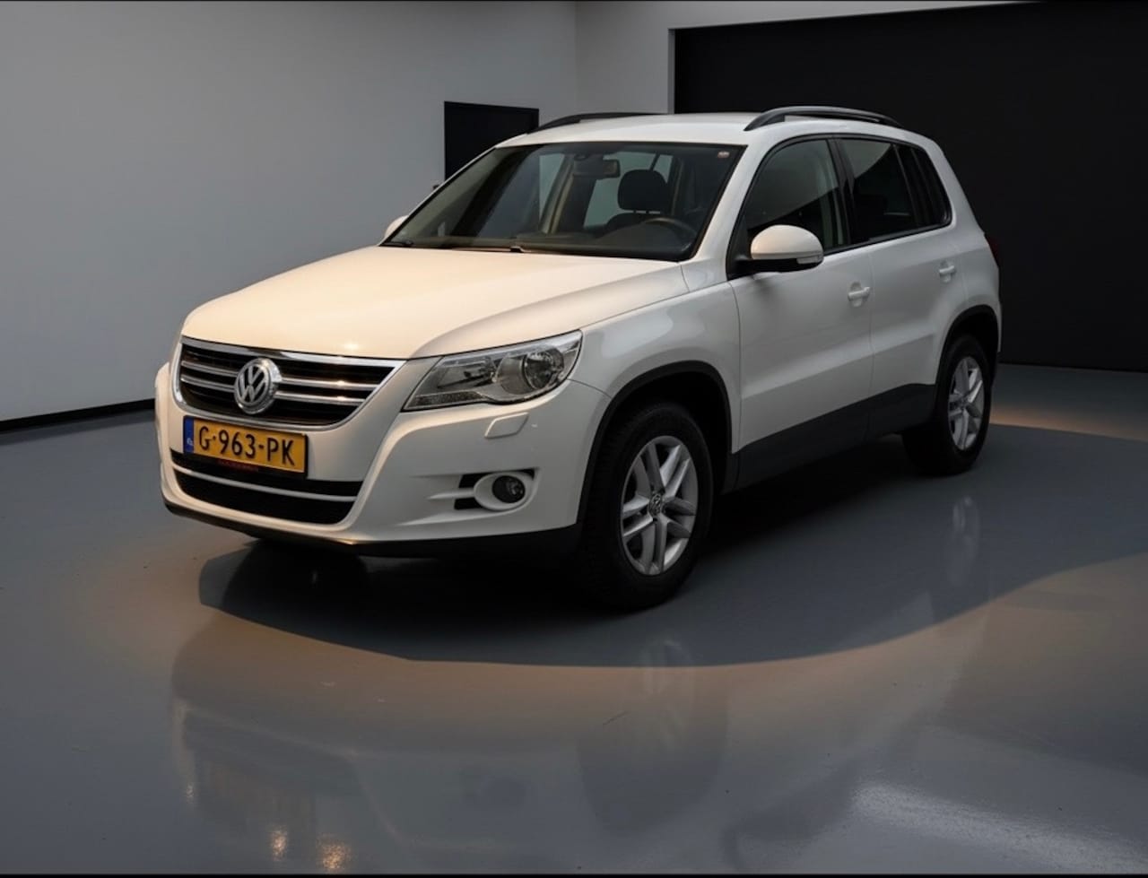 Volkswagen Tiguan - 1.4 TSI Trend&Fun-airco-elek ramen-pdc-navi - AutoWereld.nl