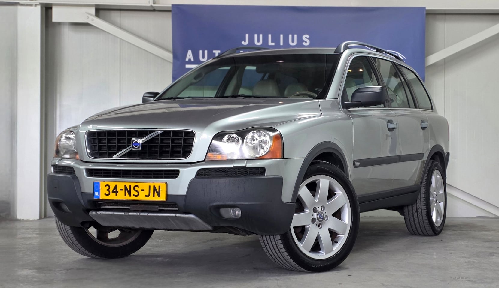 Volvo XC90 - 2.5 T Elite Volledig Onderhouden Trekhaak PremiumAudio Nieuwe APK Garantie! - AutoWereld.nl