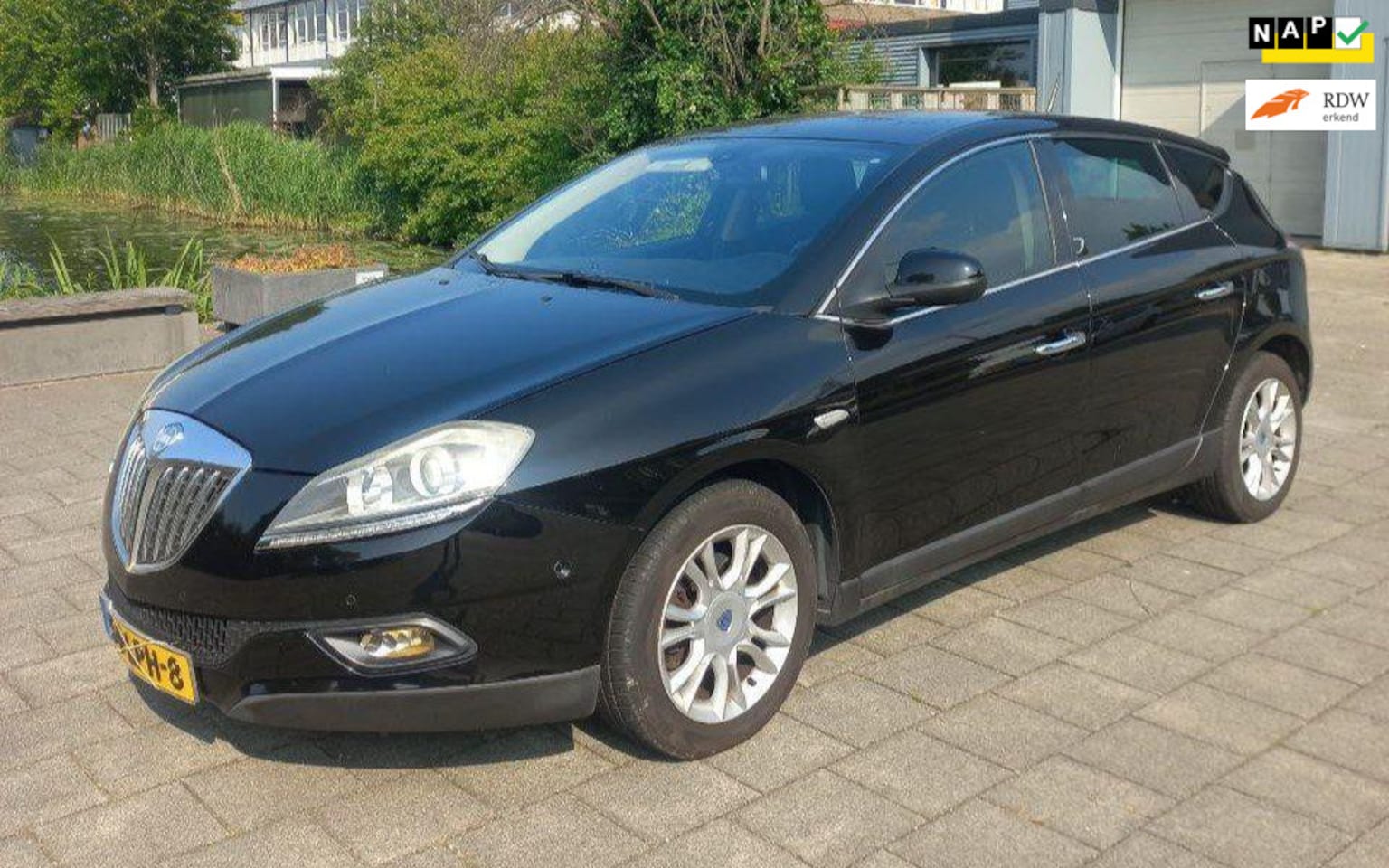 Lancia Delta - 1.4-nieuwe apk,airco, navigatie, cruise Controle, aluminium velgen - AutoWereld.nl