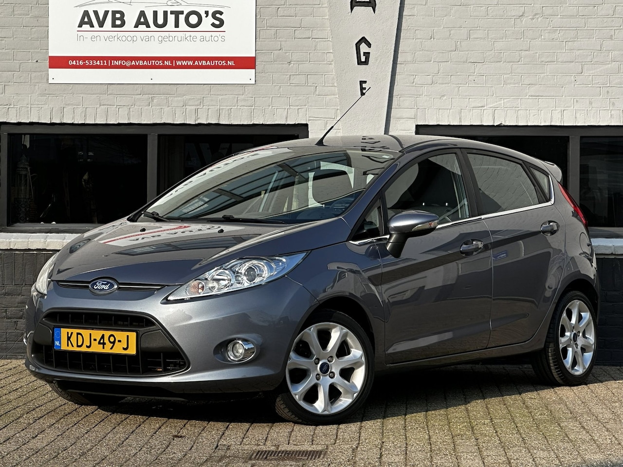Ford Fiesta - 1.25 Titanium Clima Spoiler Stoelverwarming - AutoWereld.nl