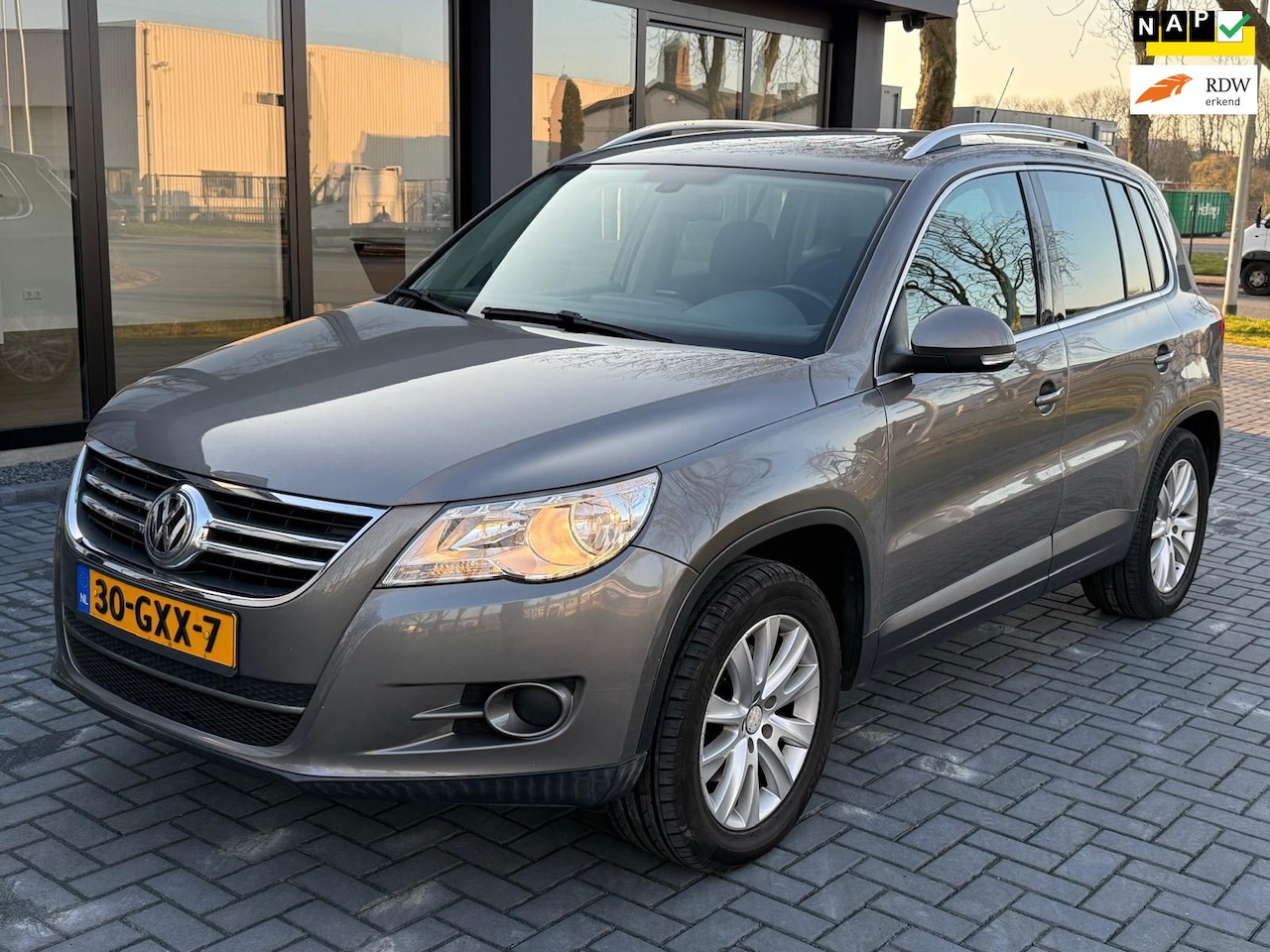 Volkswagen Tiguan - 2.0 TSI Sport&Style 4Motion Automaat - AutoWereld.nl