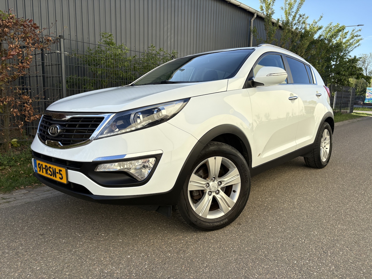 Kia Sportage - 1.6 GDI X-ecutive Plus Pack / NAVI / CRUISE / AIRCO - AutoWereld.nl