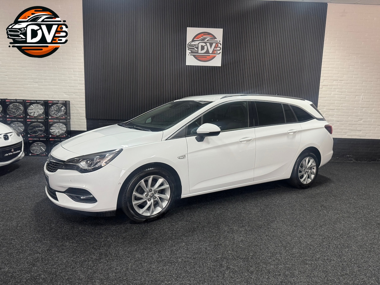 Opel Astra Sports Tourer - 1.4 Business Elegance LEES BESCHRIJVING!! LED CAR PLAY PDC AUTOMAAT - AutoWereld.nl