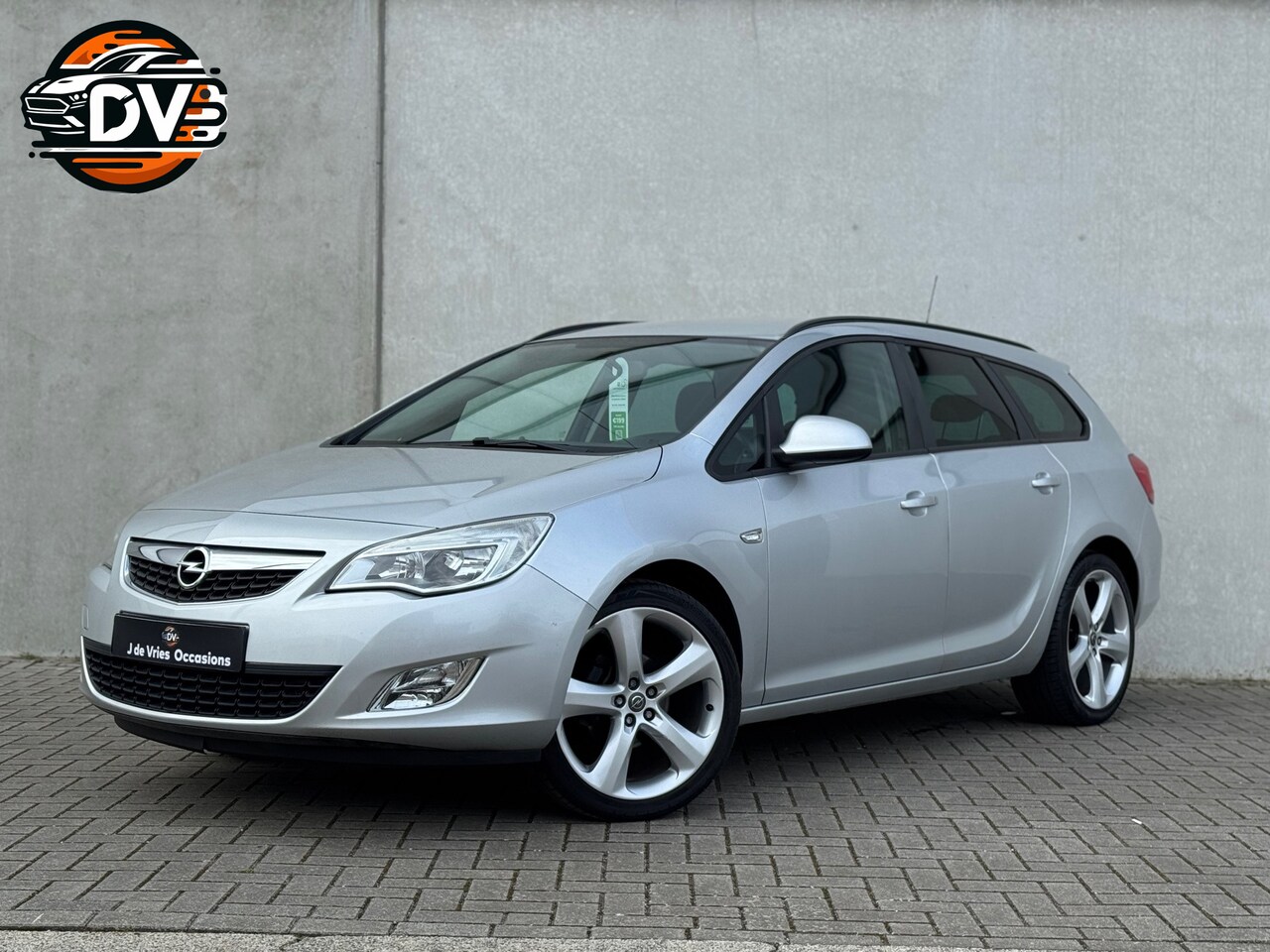 Opel Astra Sports Tourer - 1.4 Edition LMV AIRCO TREKHAAK ELEK PAKKET - AutoWereld.nl