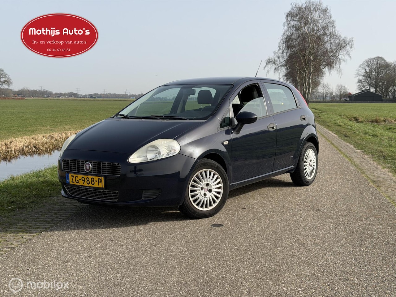 Fiat Grande Punto - 1.4 Active 5 Deurs airco nette auto! nieuwe APK! - AutoWereld.nl