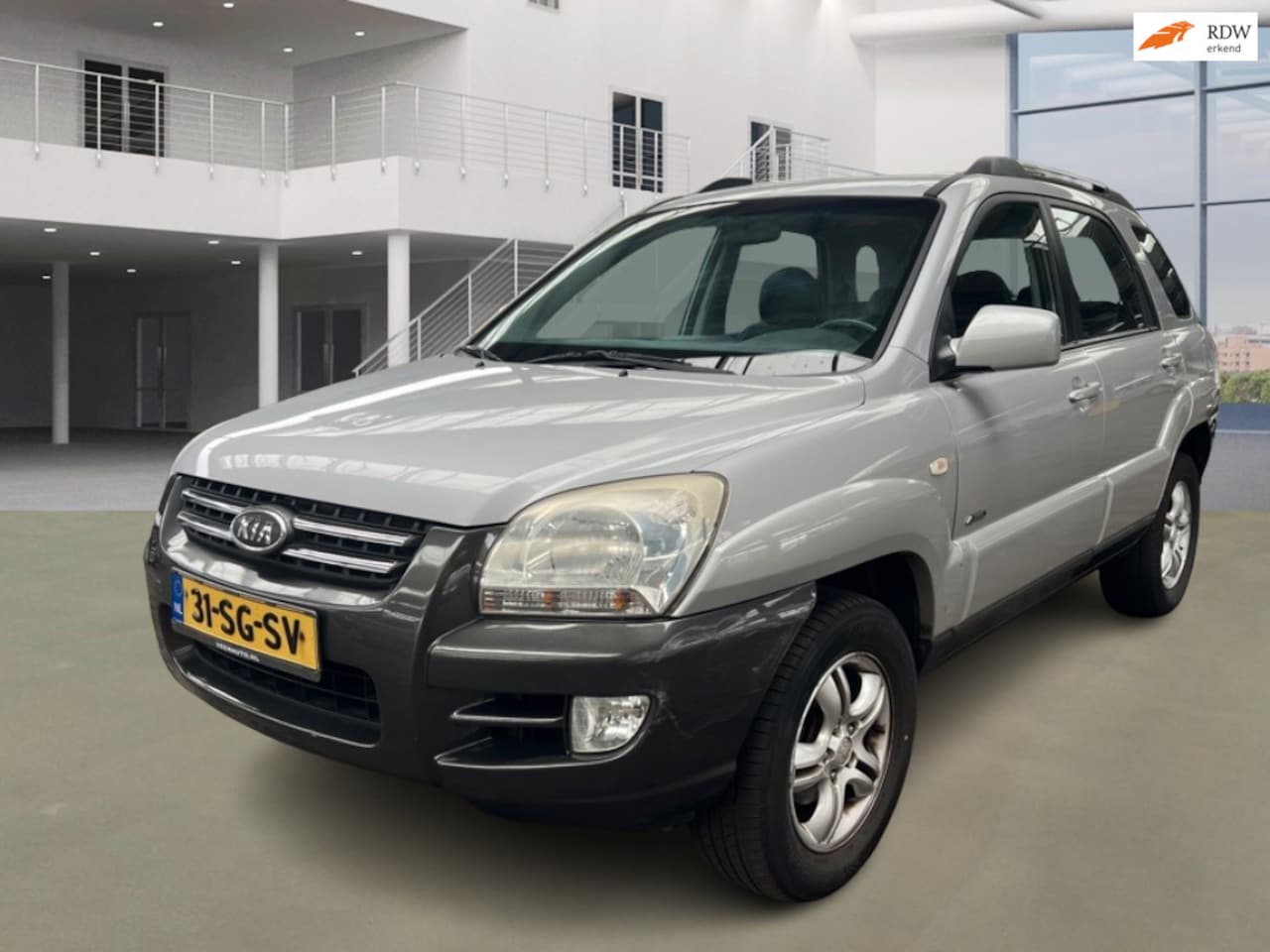 Kia Sportage - 2.0 CVVT Comfort AIRCO PARKEERSENSOR ACHTER NIEUWE APK/HALFLEDER - AutoWereld.nl