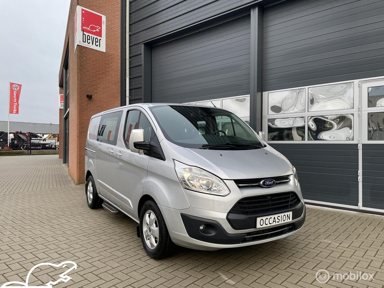 Ford Transit Custom - 280 2.0 TDCI L1H1 Limited Rolstoelbus zelfrijden - AutoWereld.nl