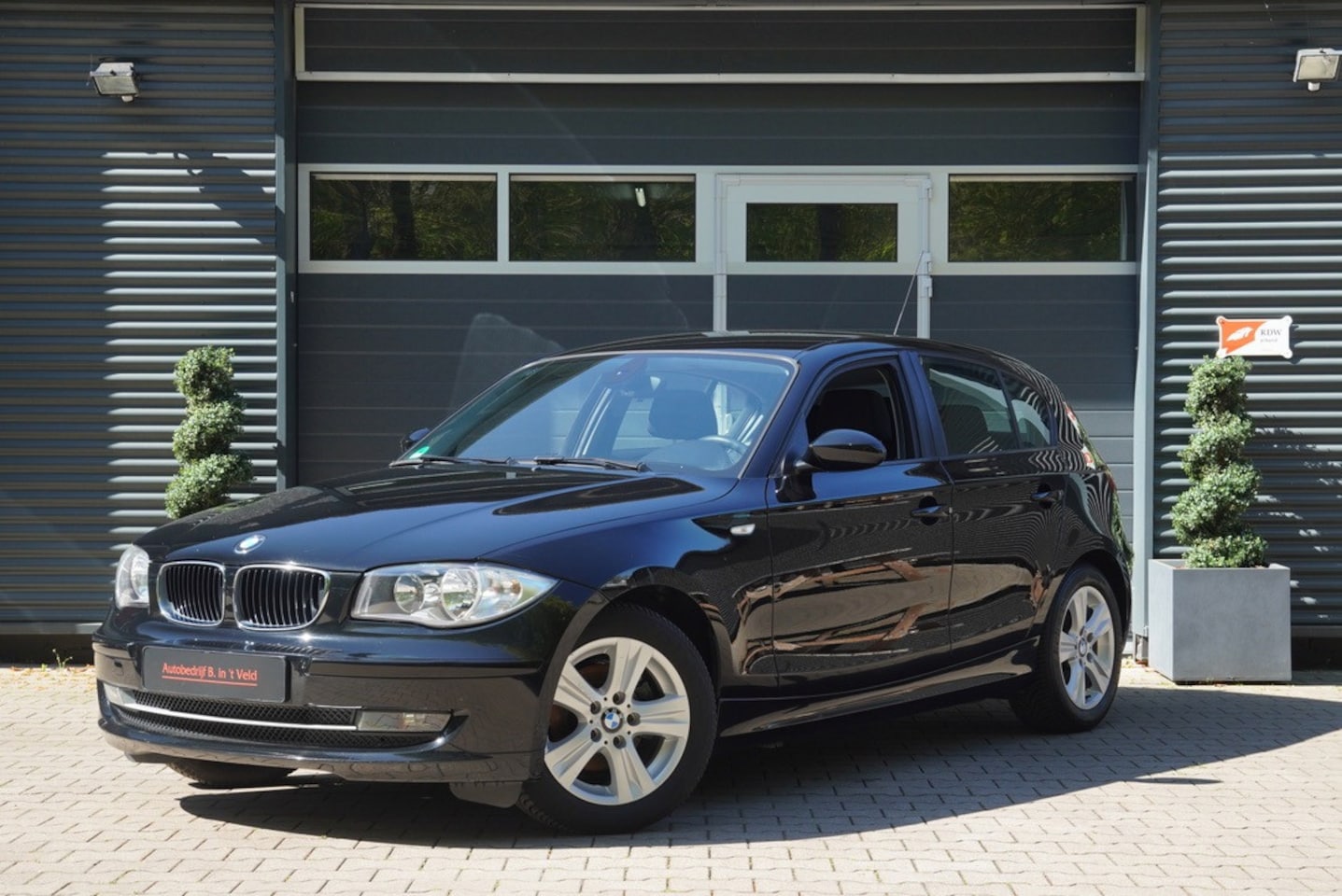 BMW 1-serie - 116i High Executive CLIMA CRUISE PDC STOELVERW. - AutoWereld.nl