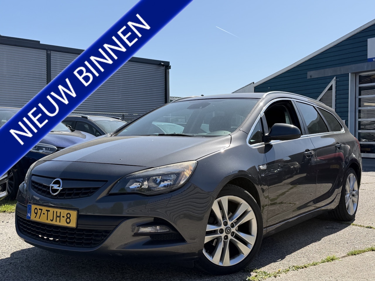 Opel Astra Sports Tourer - 1.4 Turbo Sport | ECC | 18" LMV | Navi - AutoWereld.nl