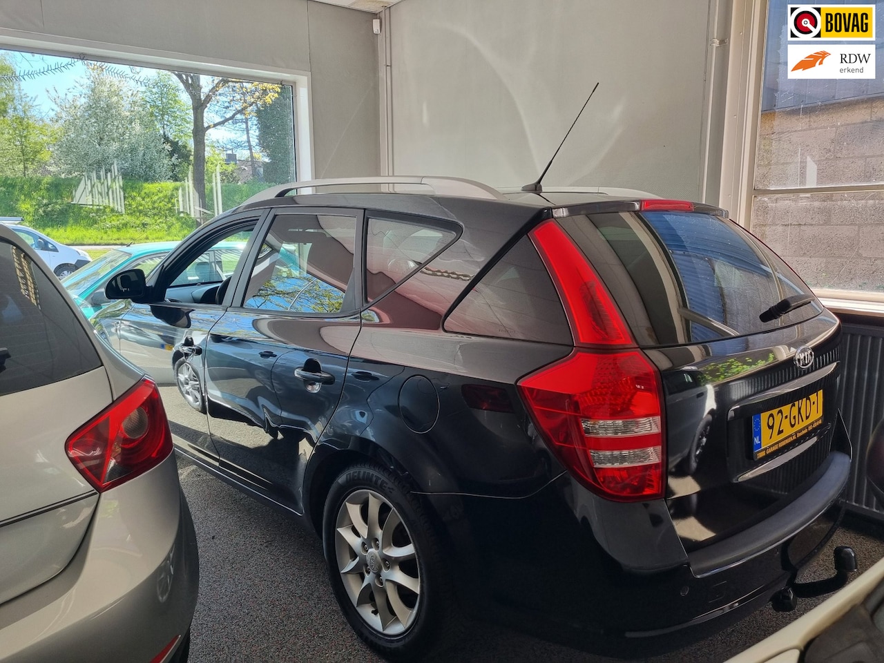 Kia Cee'd Sporty Wagon - 1.6 All Stars 5-DRS met ruilmotor 135000 km met trekhaak - AutoWereld.nl