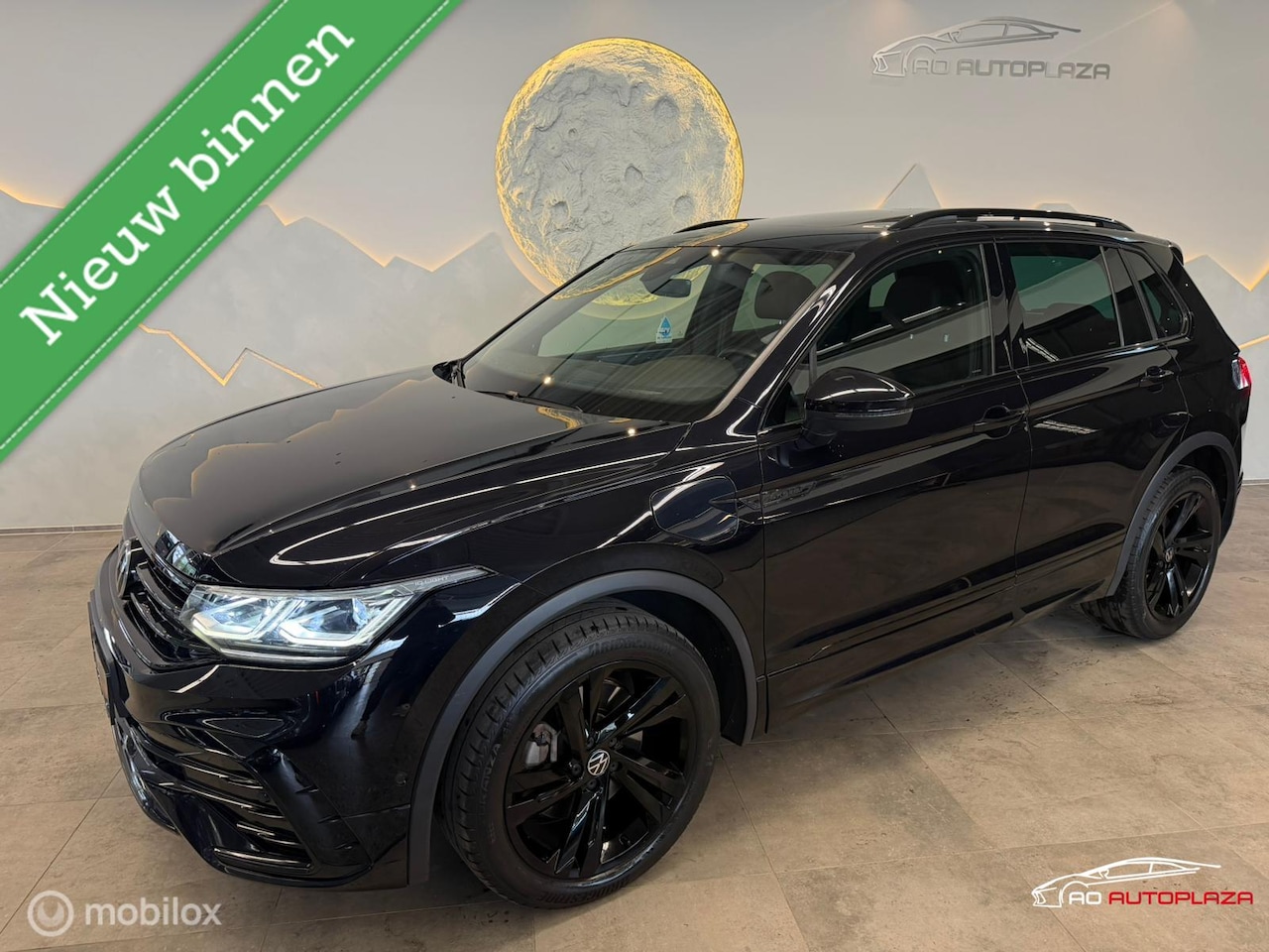 Volkswagen Tiguan - 1.4 TSI eHybrid R-Line Panorama/Keyless/Black style/360 camera - AutoWereld.nl