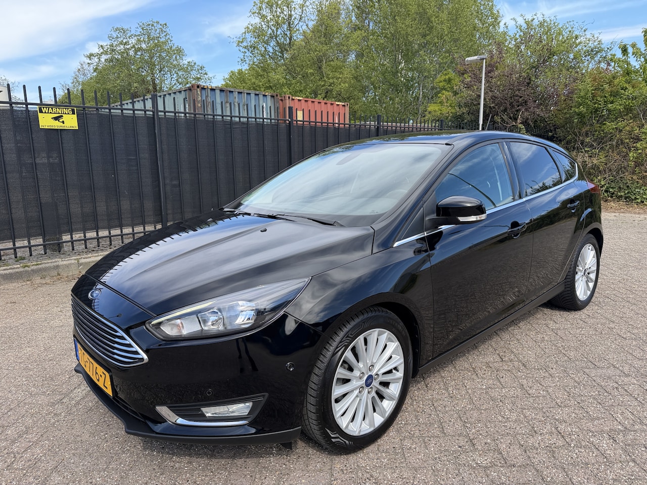 Ford Focus - 1.0 Titanium Clima/Cruise/PDC/Navi - AutoWereld.nl