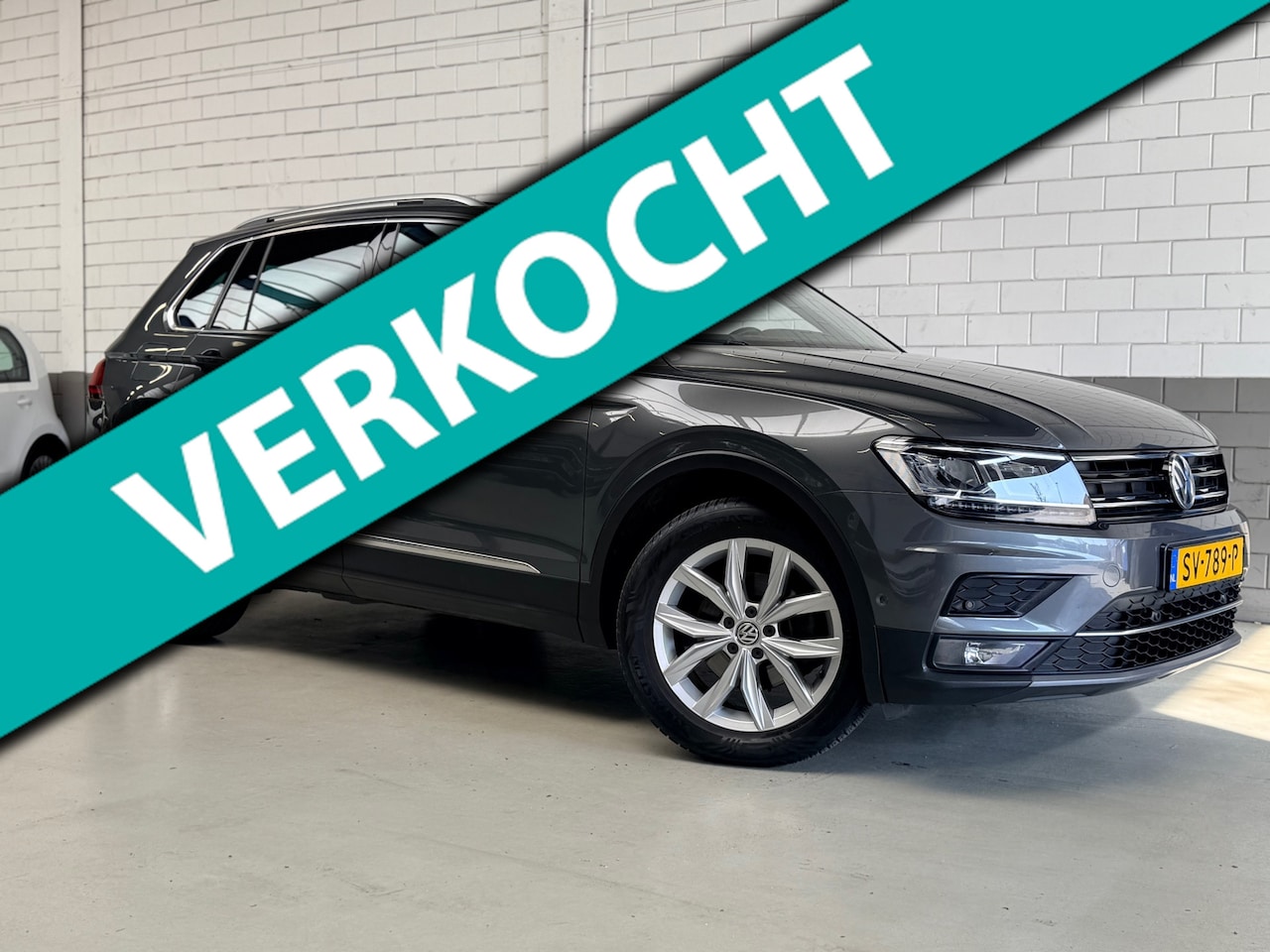 Volkswagen Tiguan - 1.4 TSI ACT Highline 1.4 TSI ACT Highline - AutoWereld.nl