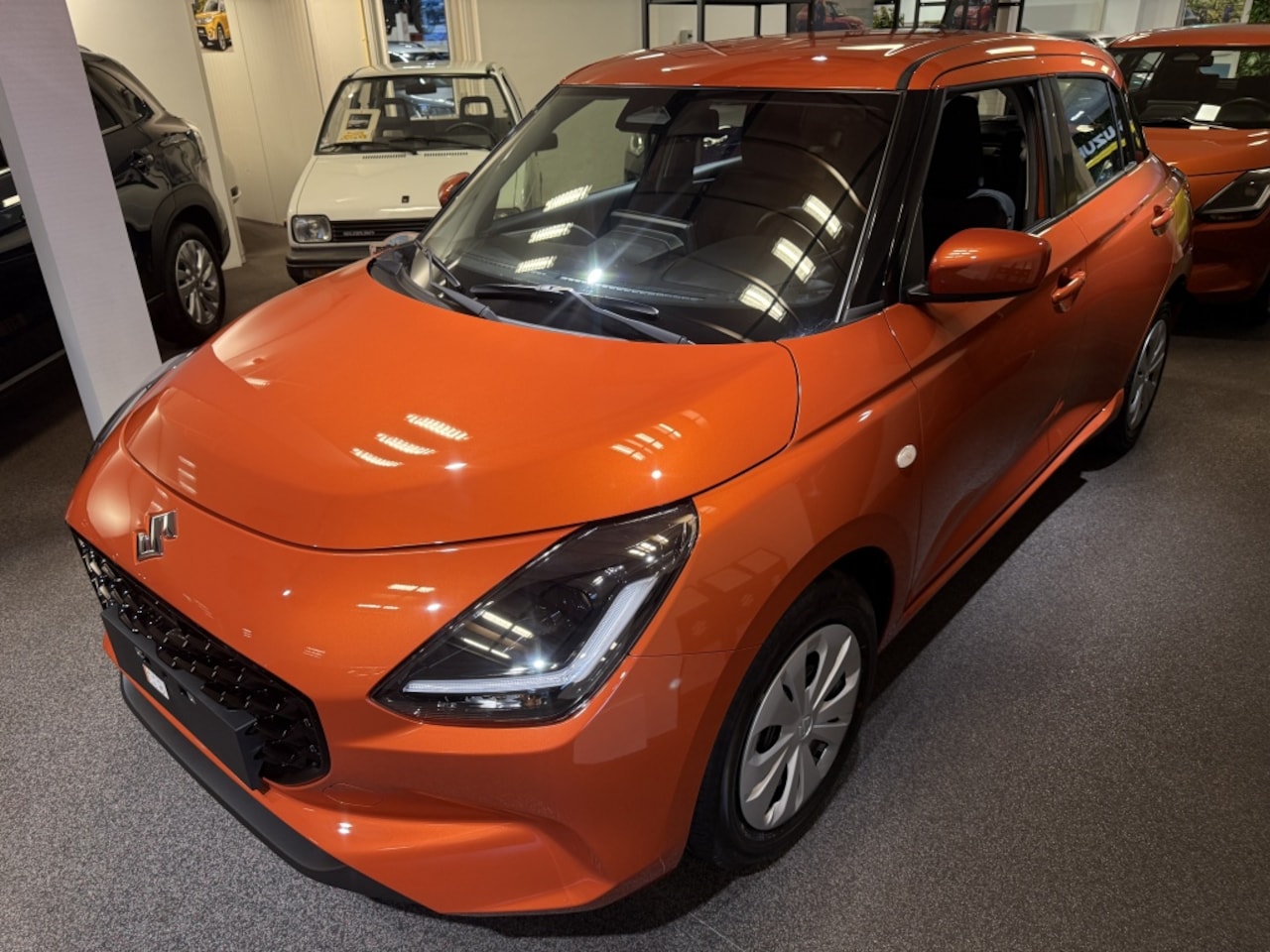 Suzuki Swift - NIEUWE AUTO 10 JAAR GARANTIE 1.2 Comfort Sm.Hyb. HOGE KORTING EXCL. BTW € 17.750,- - AutoWereld.nl