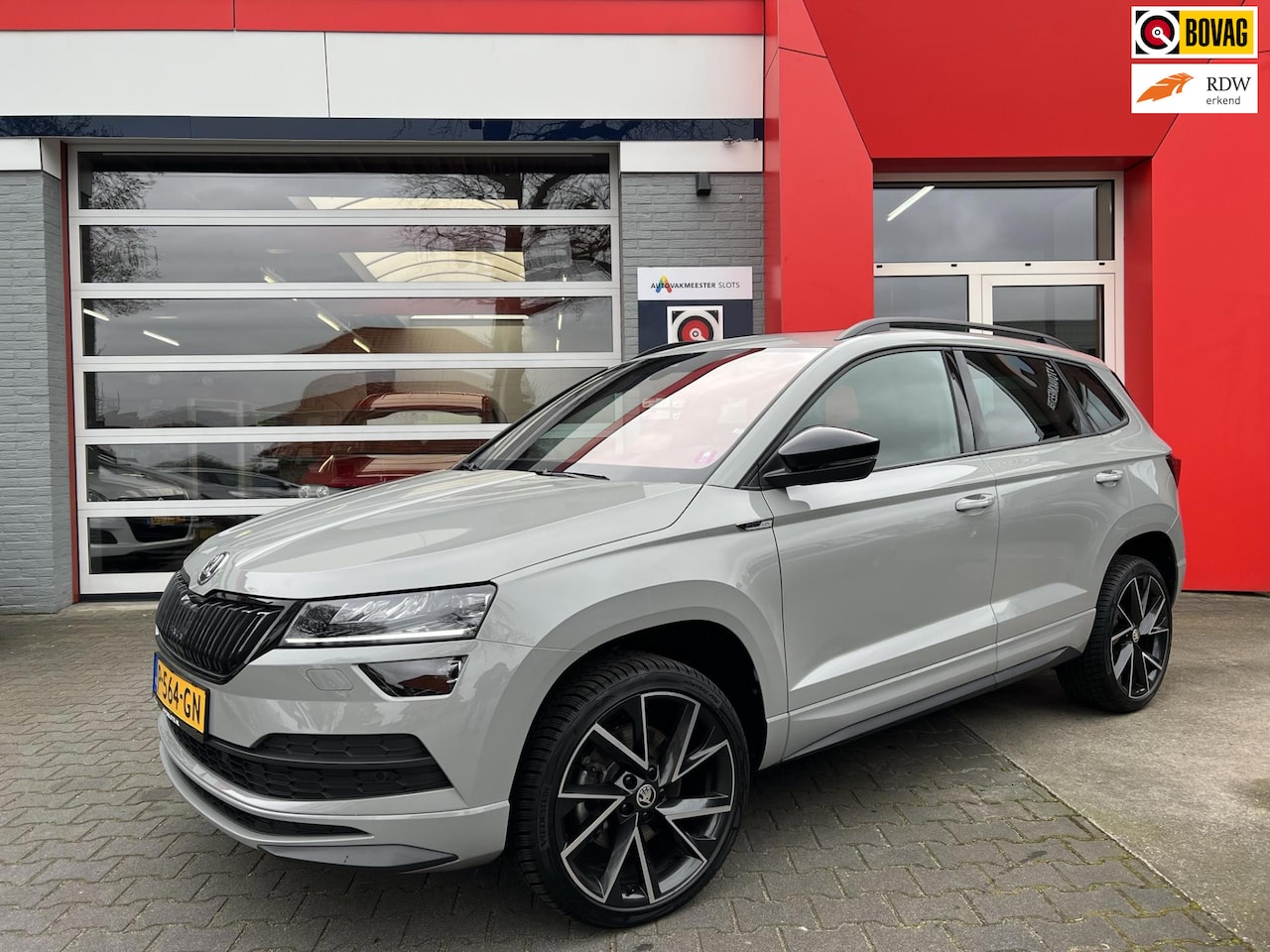 Skoda Karoq - 1.5 TSI ACT Sportline Business Pano, Trekhaak, Canton - AutoWereld.nl