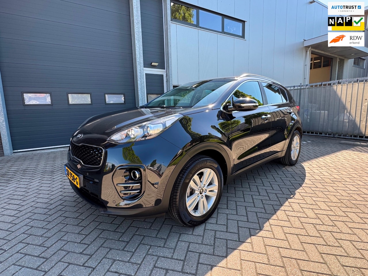 Kia Sportage - 1.6 GDI Design Edition 1.6 GDI Design Edition, Leder, Xenon, Trekhaak, Stoelverwarming, etc. - AutoWereld.nl