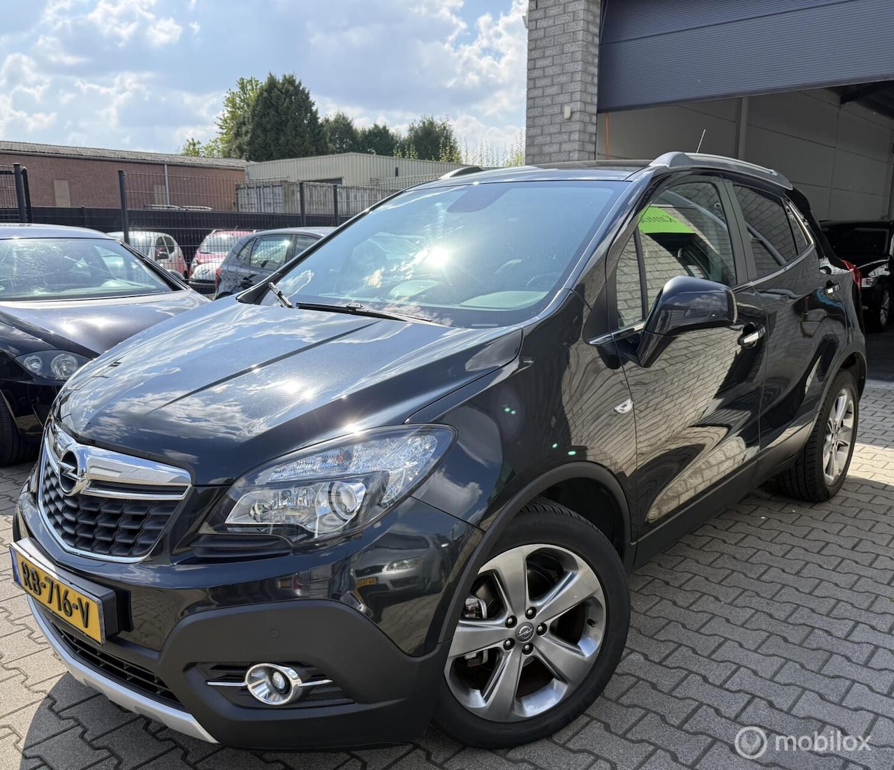 Opel Mokka - 1.4 T Cosmo 4x4 / Navi / Leer / N.A.P - AutoWereld.nl