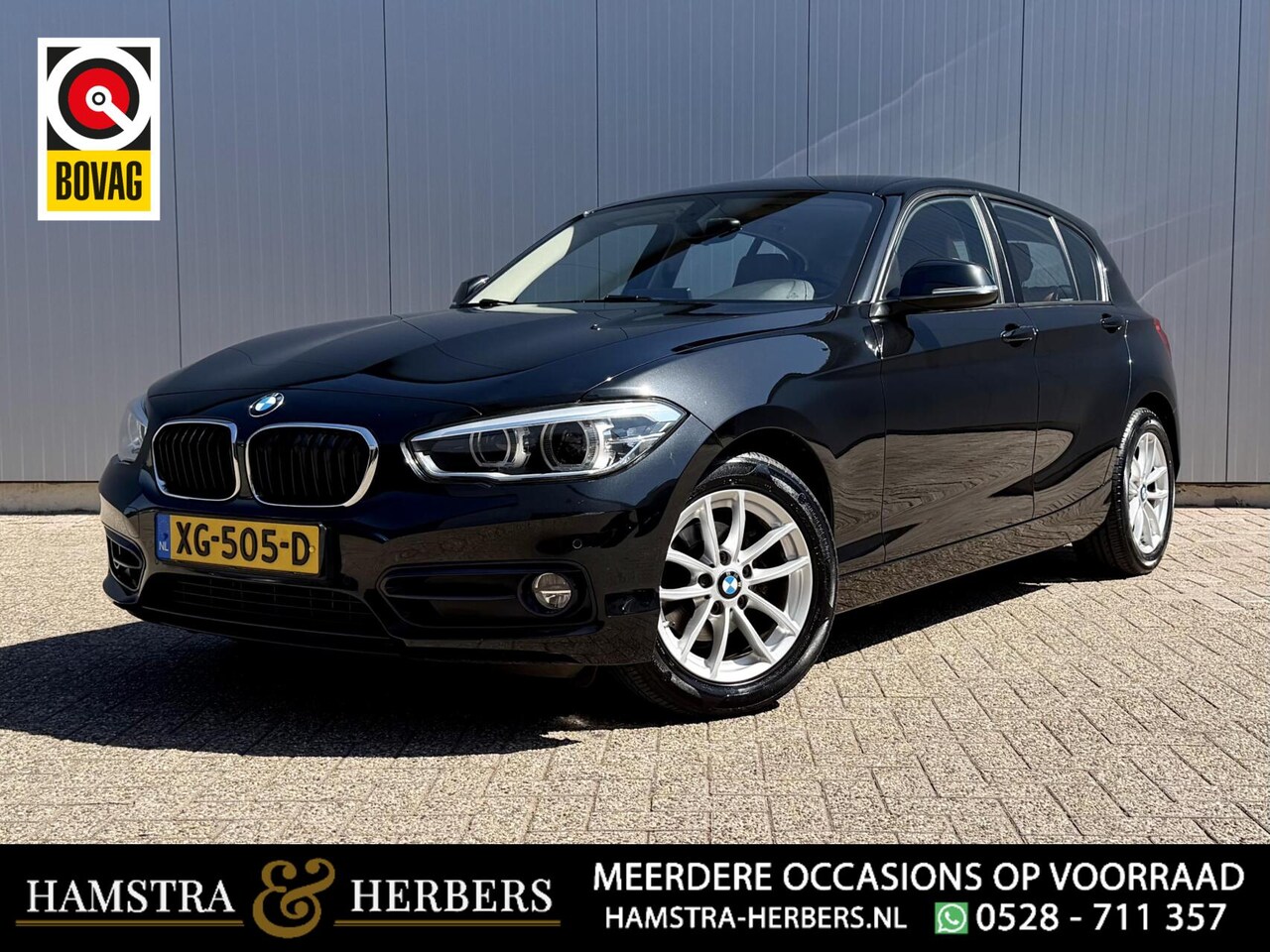 BMW 1-serie - 118i High Executive Sport line zwart automaat - AutoWereld.nl