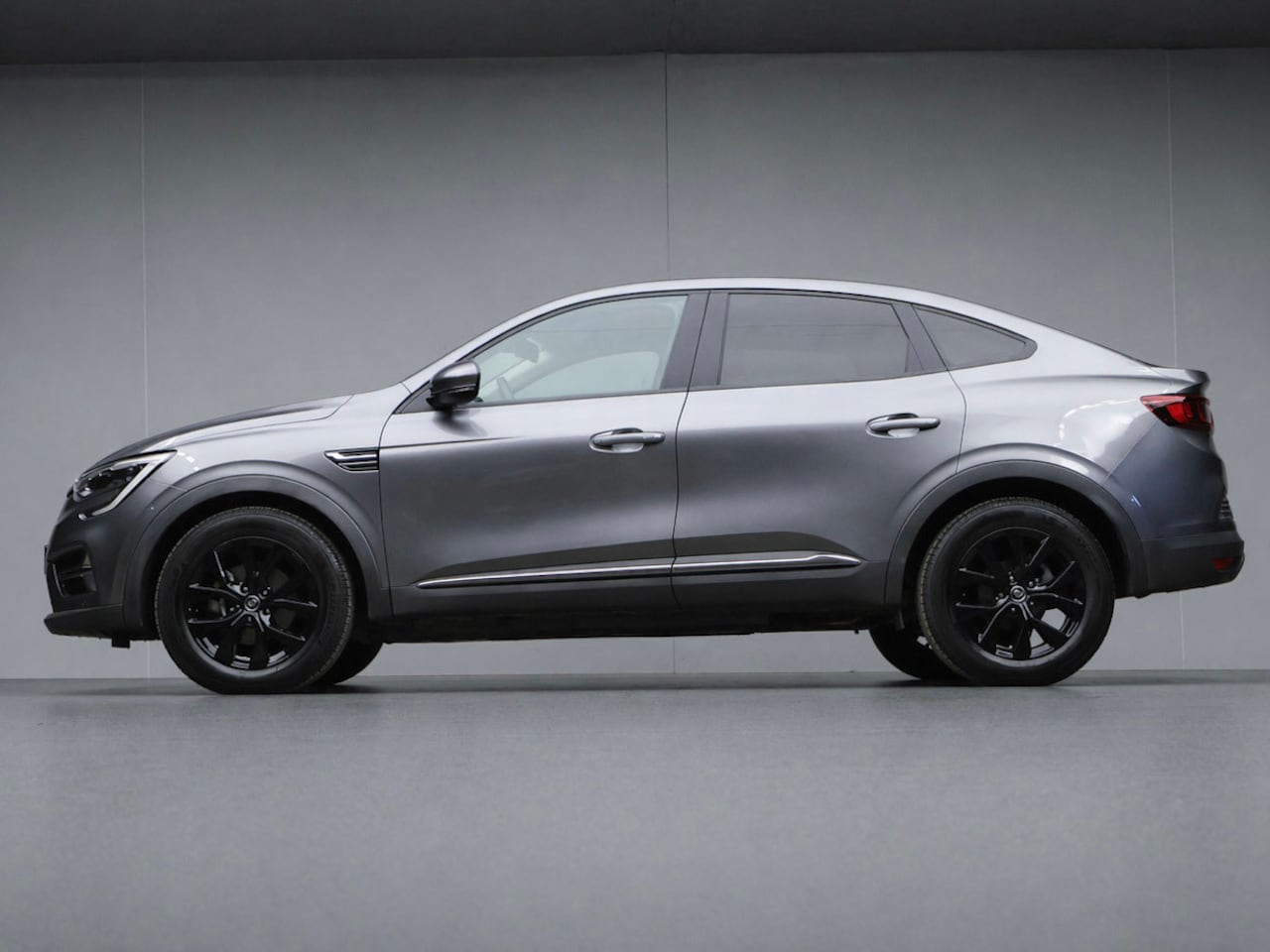 Renault Arkana - 1.6 E-Tech Hybrid 145 Zen Sport (APPLE CARPLAY,NAVI,CAMERA,PDC,CLIMATE,CRUISE,GETINT,LED,S - AutoWereld.nl