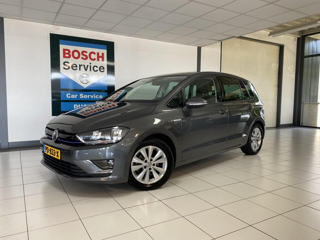 Volkswagen Golf Sportsvan - 1.0 TSI Comfortline Navigatie /Airco / Carplay / Camera - AutoWereld.nl