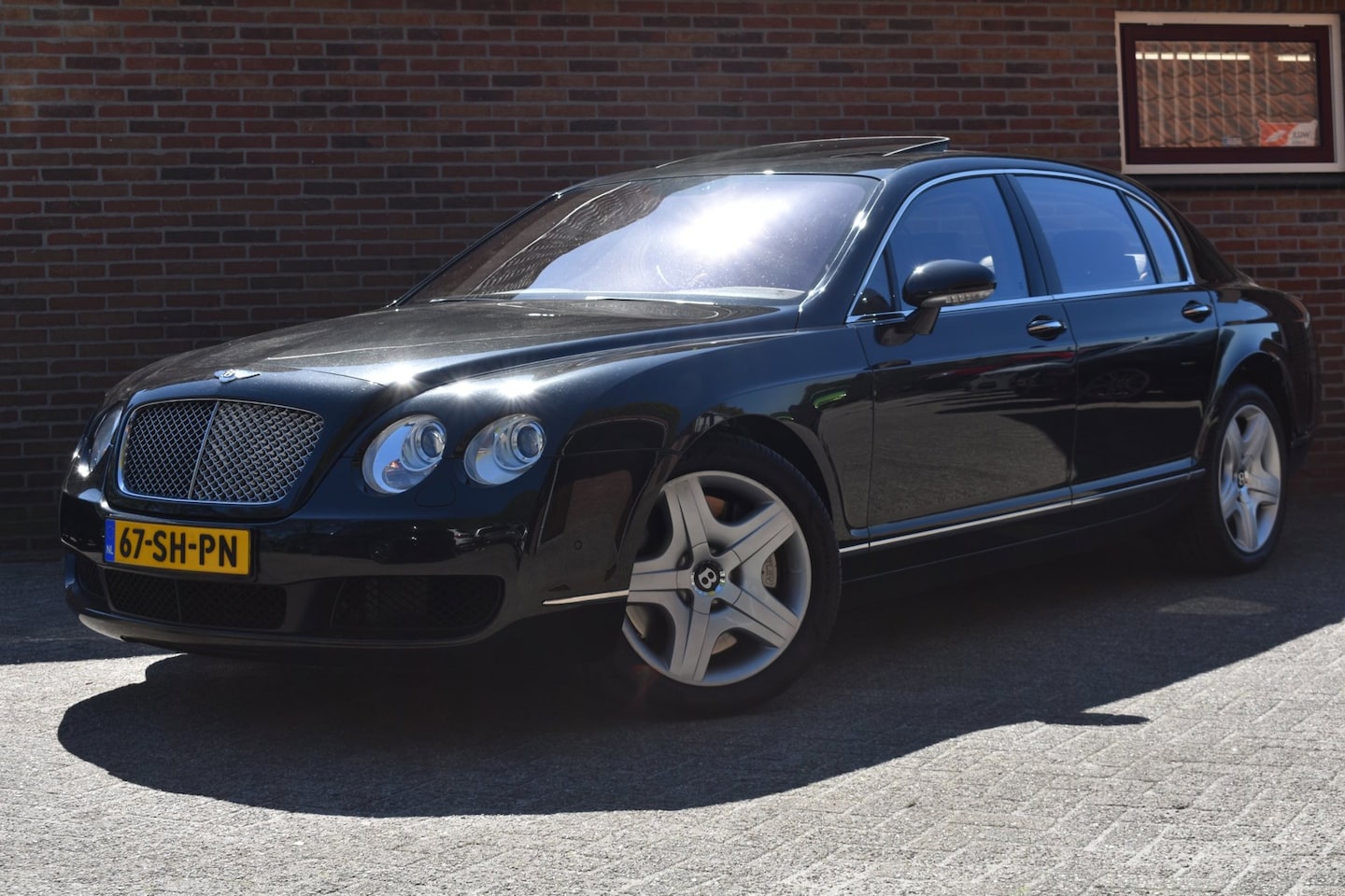 Bentley Continental Flying Spur - 6.0 W12 561pk '06 Orig NL Auto Leder Clima Navi Cruise - AutoWereld.nl