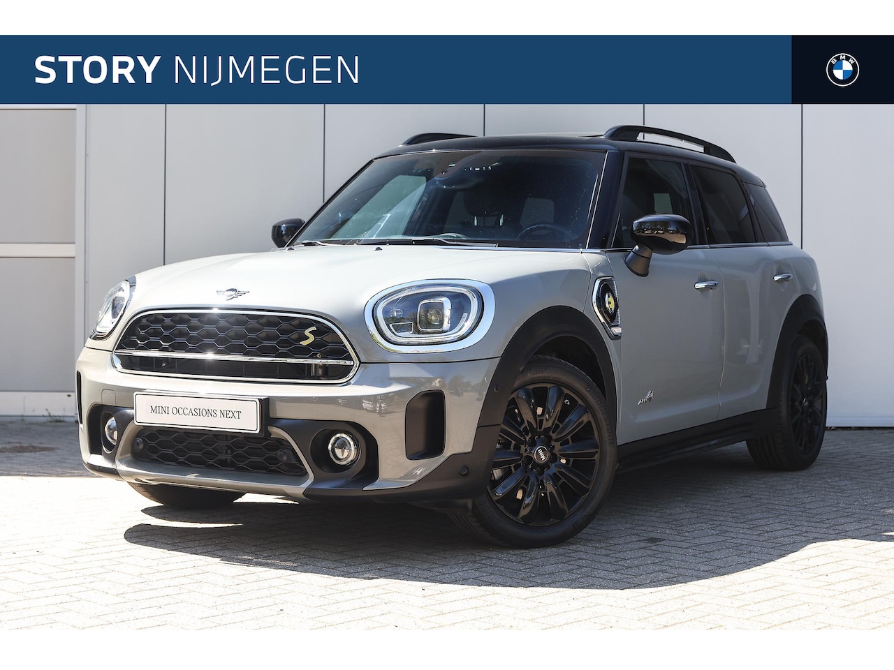 MINI Countryman - Cooper SE ALL4 Automaat / Panoramadak / Comfortstoelen / Comfort Access / Stoelverwarming - AutoWereld.nl