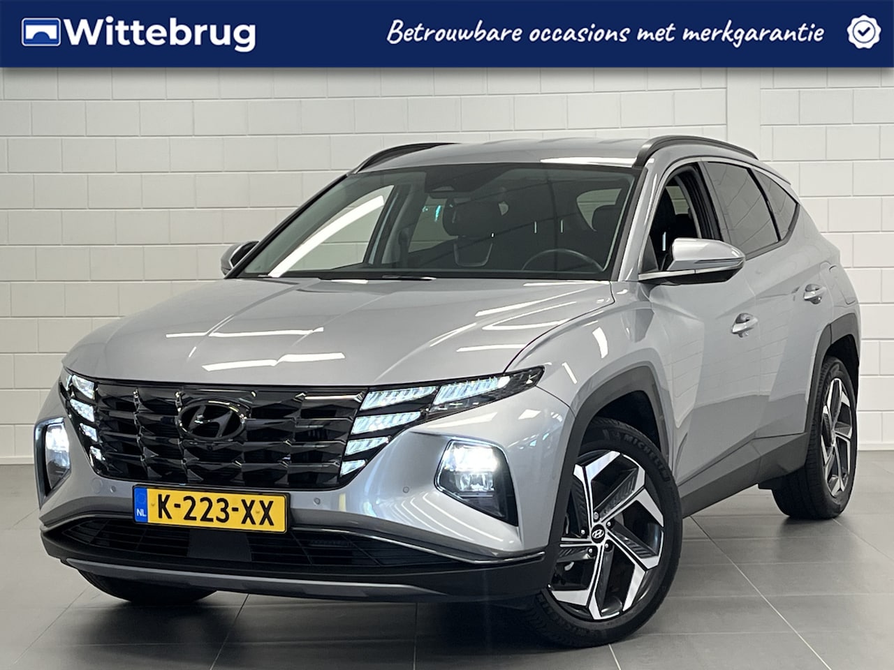 Hyundai Tucson - 1.6 T-GDI HEV Premium LEDER | FULL LED | 19 INCH | DEALER ONDERHOUDEN - AutoWereld.nl