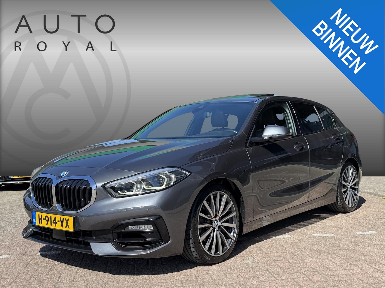BMW 1-serie - 118i High Executive Edition PANORAMADAK | NAVIGATIE | STOELVERWARMING | CAMERA | LEDER SPO - AutoWereld.nl