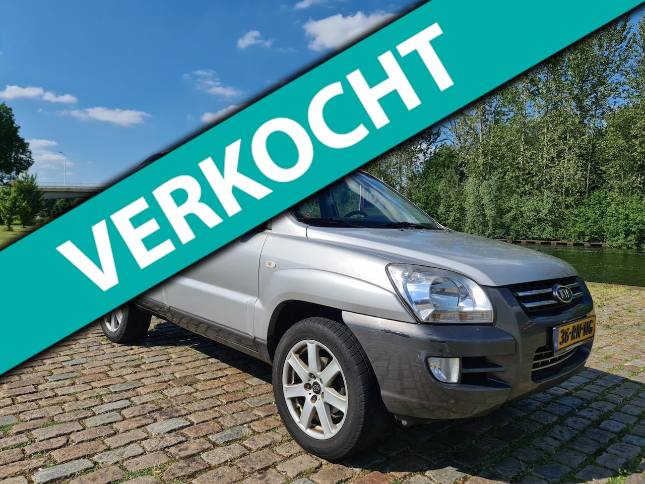 Kia Sportage - 2.7 V6 Adventure 4WD Automaat 2e eigenaar leerbekeleding cruis control parkeer sensor airc - AutoWereld.nl