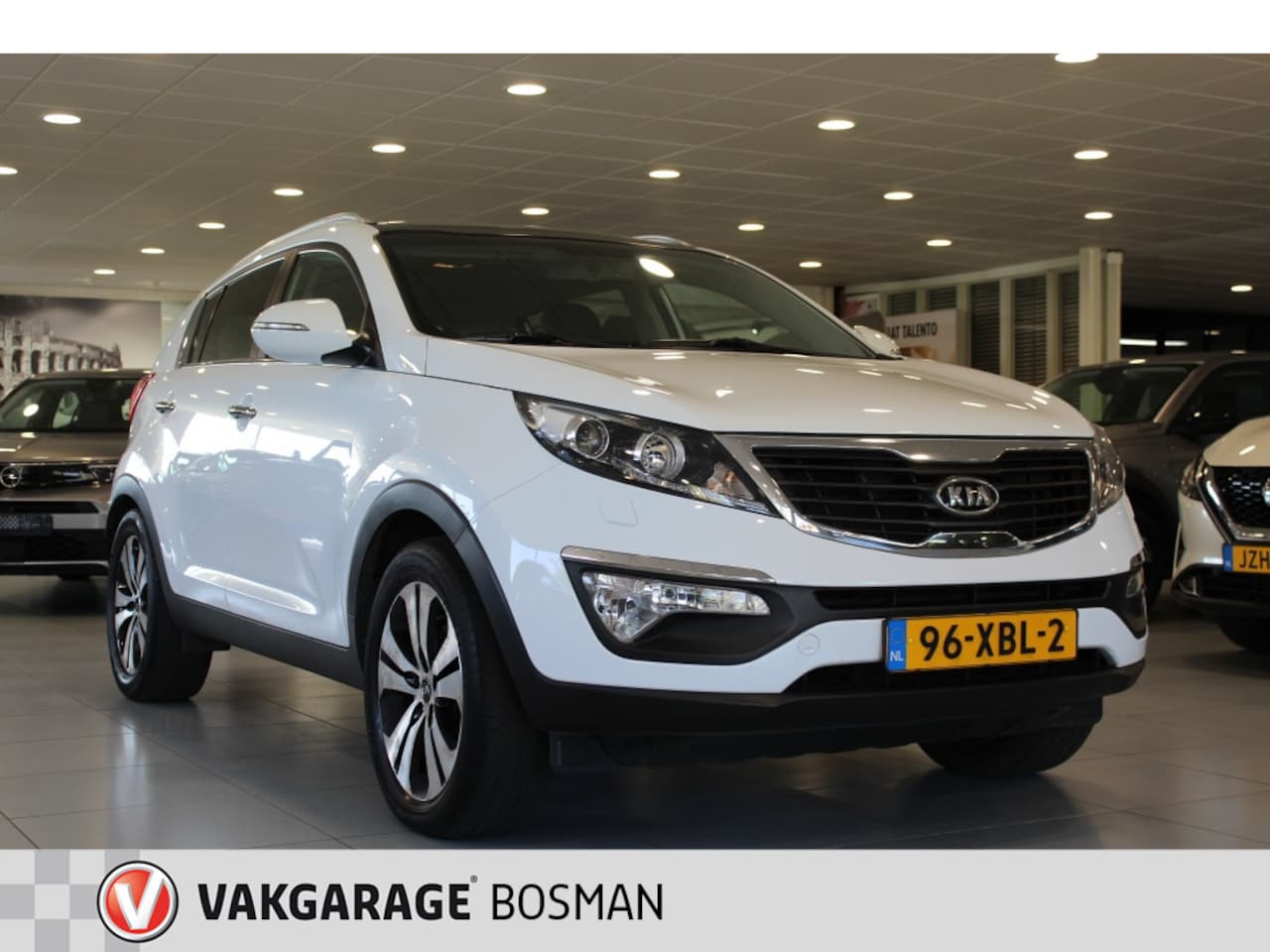 Kia Sportage - 2.0 X-clusive/LEDER/PANO/TREKHAAK - AutoWereld.nl
