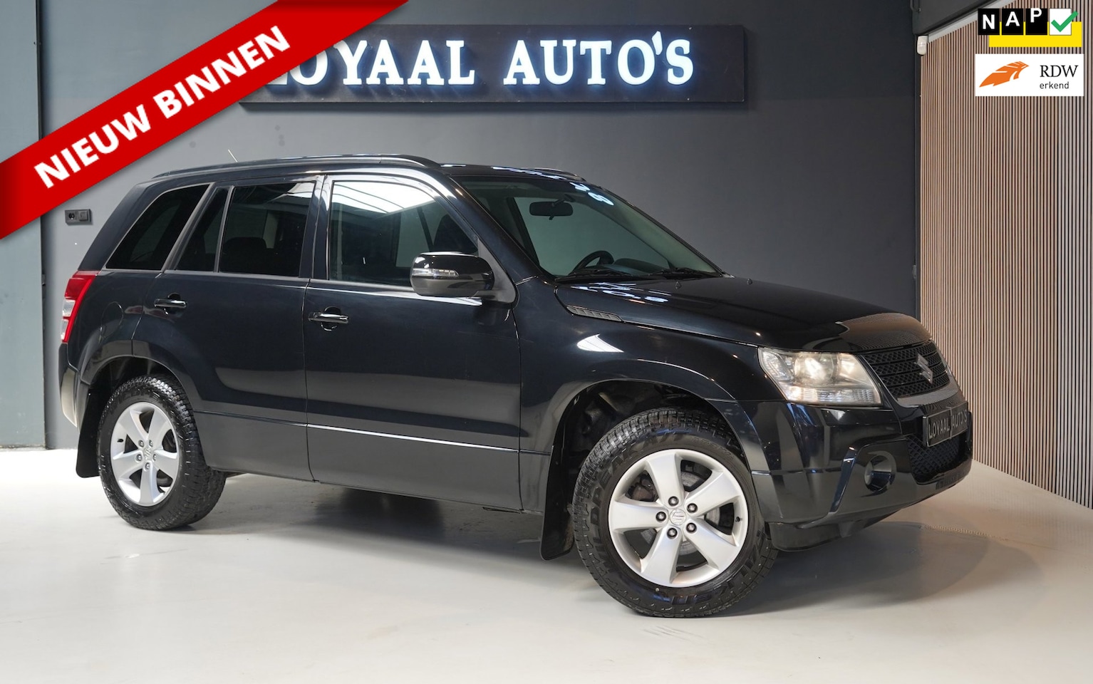 Suzuki Grand Vitara - 2.4 Exclusive | 4X4 | CRUISE | STOELVERW. | TREKHAAK | ACHERUITRIJCAMERA | APK | NAP. - AutoWereld.nl