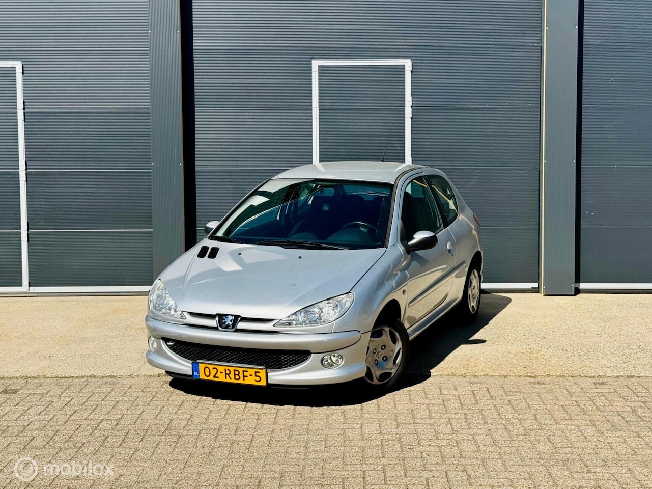 Peugeot 206 - 1.6 AUTOMAAT LAGE KMSTAND nieuwe apk - AutoWereld.nl