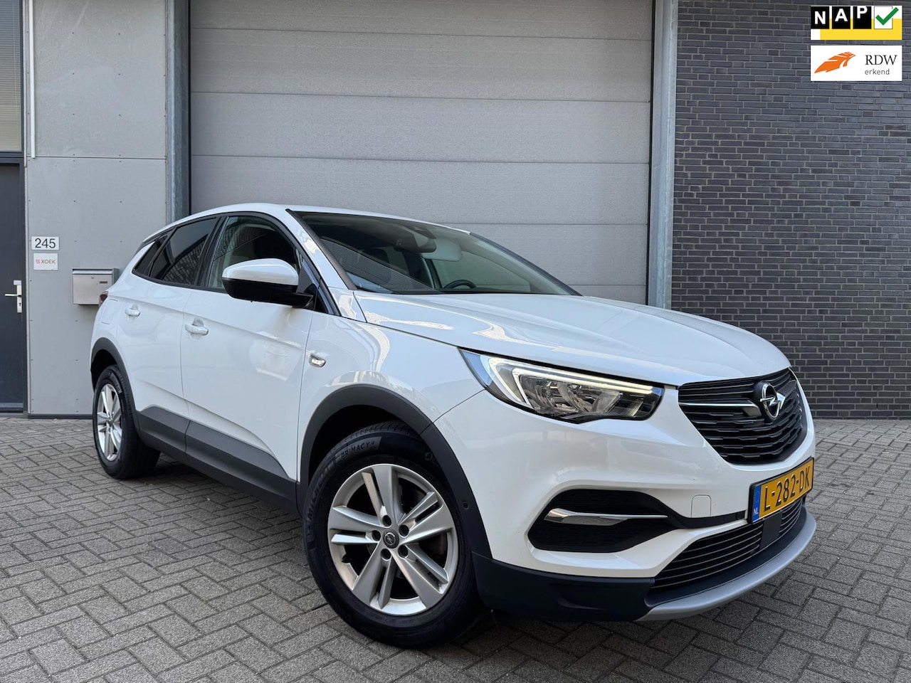 Opel Grandland X - 1.2 Turbo Elegance [Dealer OH | Achteruitrijcamera | Carplay | Cruise | Navi | Topstaat] - AutoWereld.nl