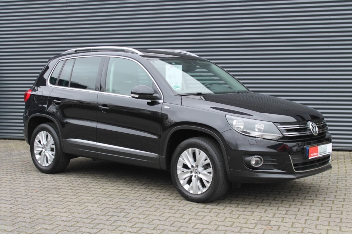 Volkswagen Tiguan - 1.4 TSi SportenStyle Uitv. NAVIGATIE - AutoWereld.nl
