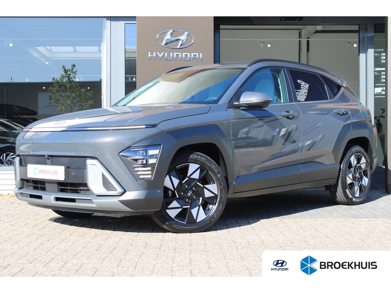 Hyundai Kona - 1.6 GDI HEV Premium | Achteruitrijcamera | Audio installatie premium | DAB ontvanger - AutoWereld.nl