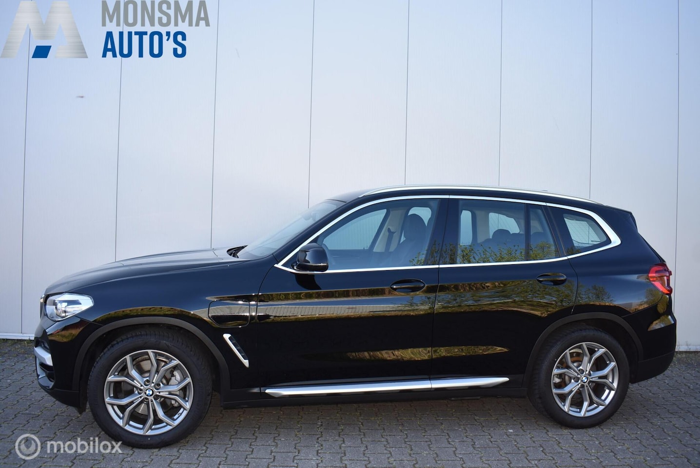 BMW X3 - xDrive30e High Exe Schwarz ll Live Cockpit H/K Trekhaak - AutoWereld.nl