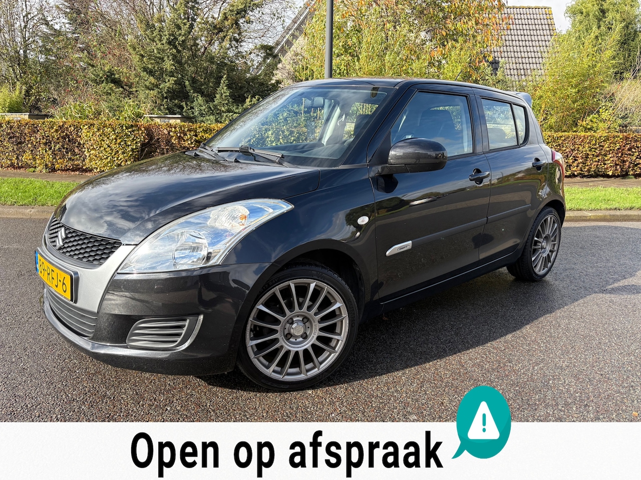 Suzuki Swift - 1.2 Comfort EASSS 5DRS|Stoelverwarming|Sportline|Airco - AutoWereld.nl