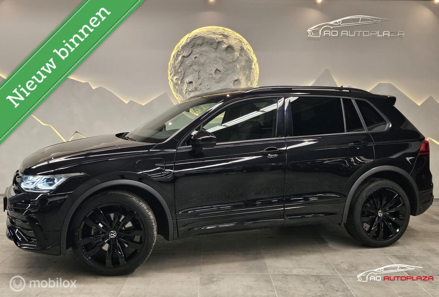 Volkswagen Tiguan - 1.4 TSI eHybrid 3x R-Line Panorama/Black style/Trekhaak - AutoWereld.nl