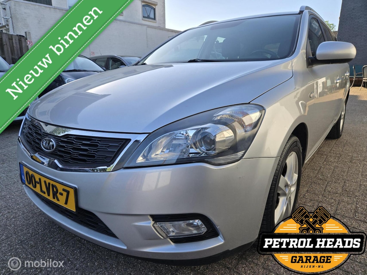 Kia Cee'd Sporty Wagon - 1.4 CVVT Seven 1.4 CVVT Seven - AutoWereld.nl